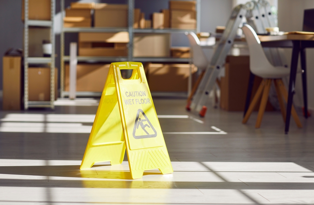 Caution,wet,floor,sign,left,by,janitorial,service,workers,in